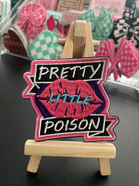 Pretty little poison embroidered iron on patch